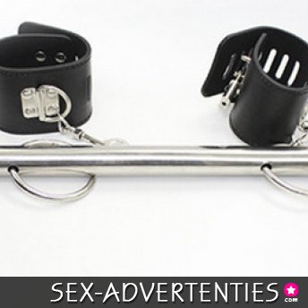 spreidstang met hand-enkel boeien.